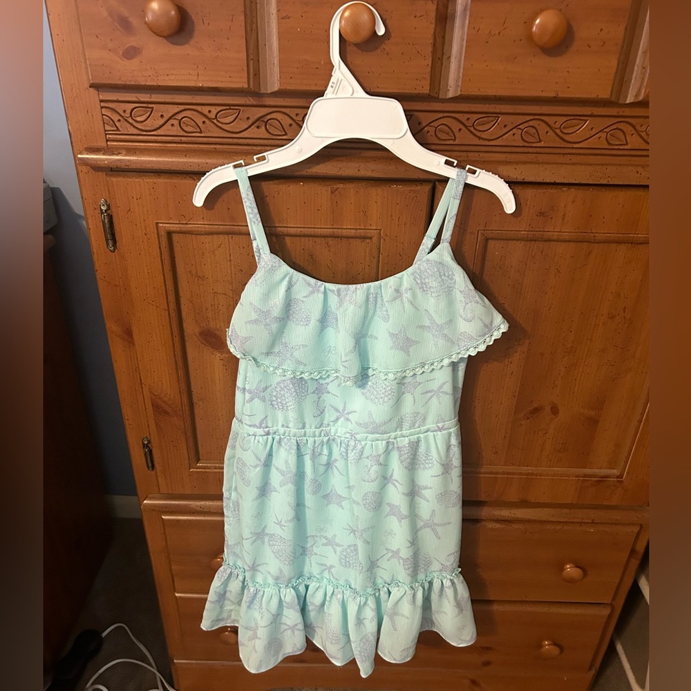 Light blue, sea themed design, sleeveless dress